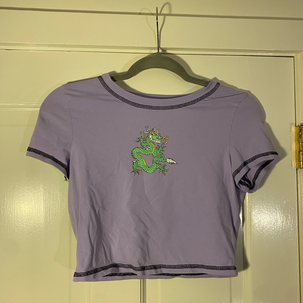 Purple Baby Tee with Green Dragon icon and black stitching